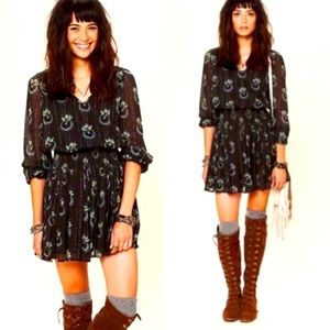 Free People “Wild Horses” smocked dress in size XS